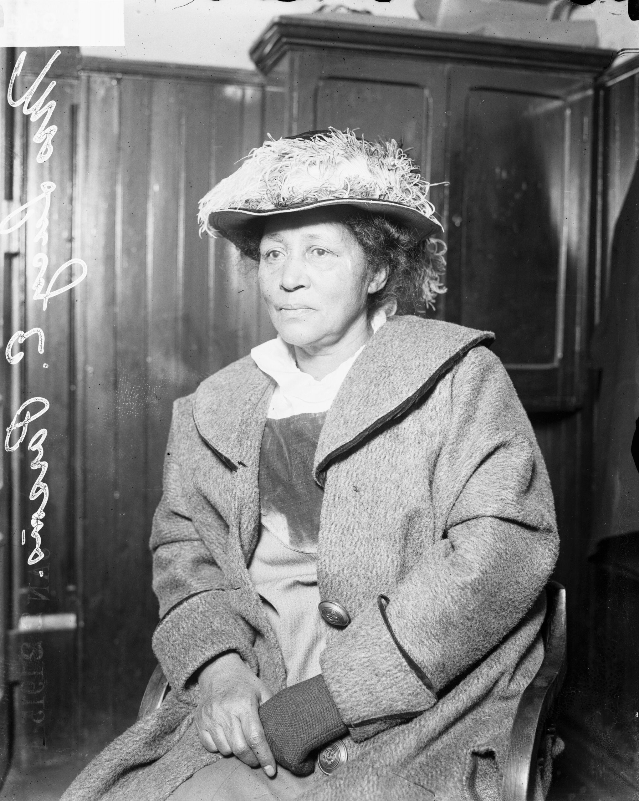 Three-quarter length portrait of Mrs. Lucy E. Parsons, arrested for rioting during an unemployment protest at Hull House in Chicago.