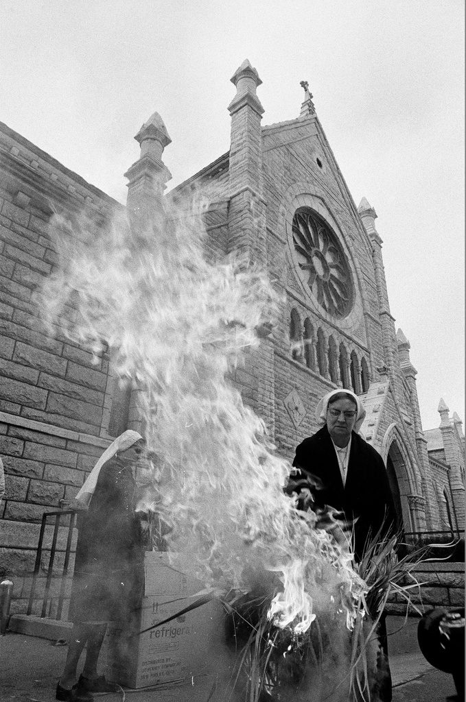 Nuns burning palms for Ash Wednesday in front of Holy Name Cathedral