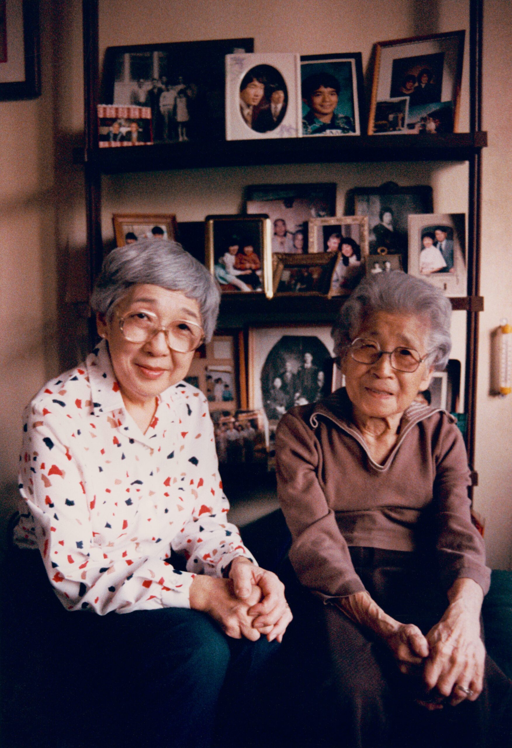 An 88-year-old woman sitting with her daughter