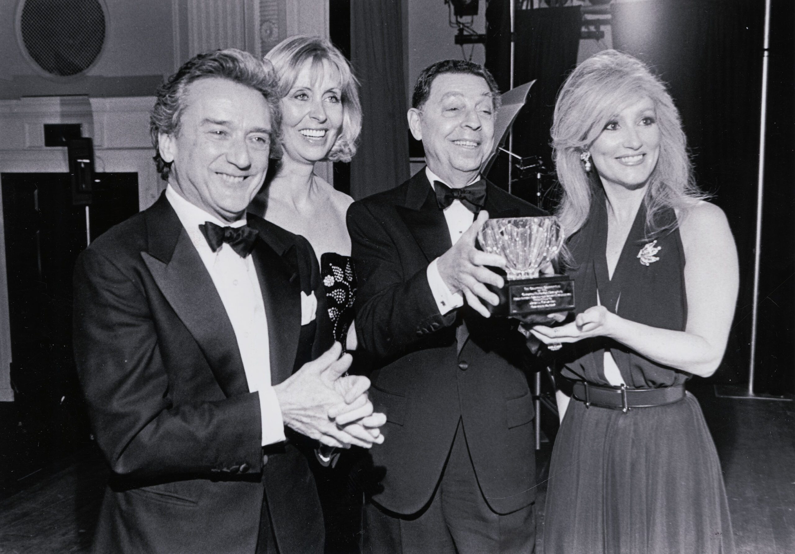 (From left to right) Mr. Victor Skrebneski, Mrs. Owen H. Deutsch and Mrs. Donna L. (Sugar) Rautbord, Chicago Historical Society Donors' Ball Co-Chairs, flanking Mr. James Galanos, fashion designer who received the first Costume Committee Award for Design Excellence in a special ceremony at the Donors' Ball, Chicago, Illinois, November 20, 1992.