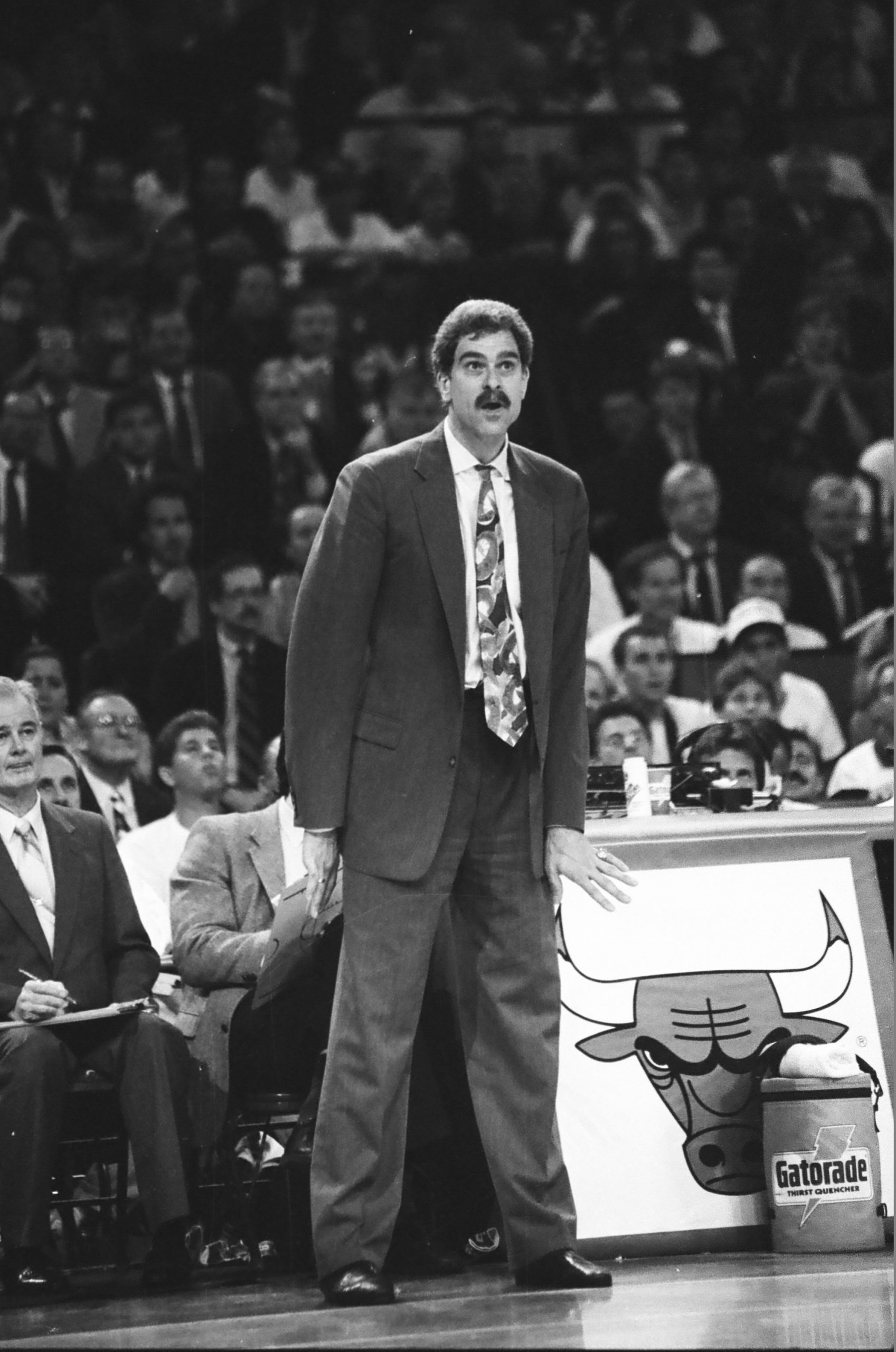 Coach Phil Jackson stands on the sidelines
