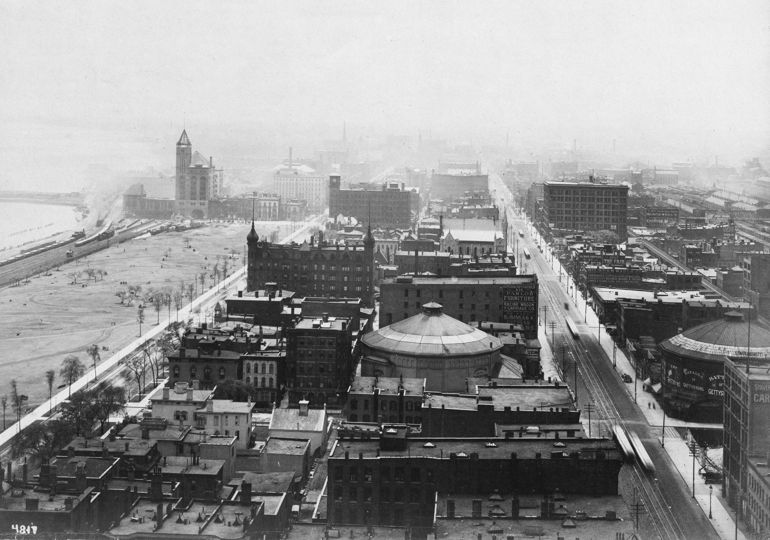 Aerial view of Chicago looking south down Michigan avenue two circular cyclorama buildings can be seen in foreground