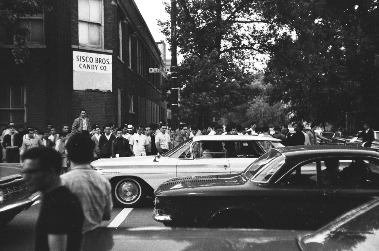 Police patrol during Division Street riots