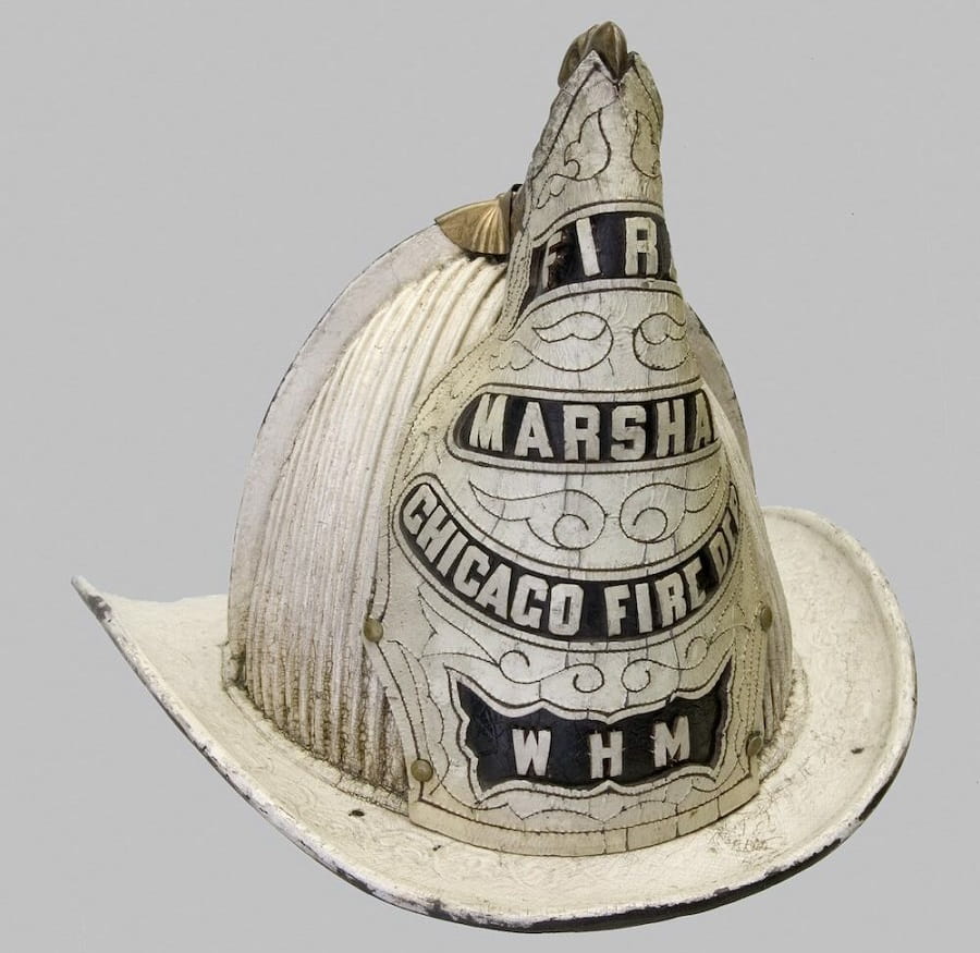 Front view of a Chicago Fire Department fire marshall helmet used during the Chicago Fire of 1871.