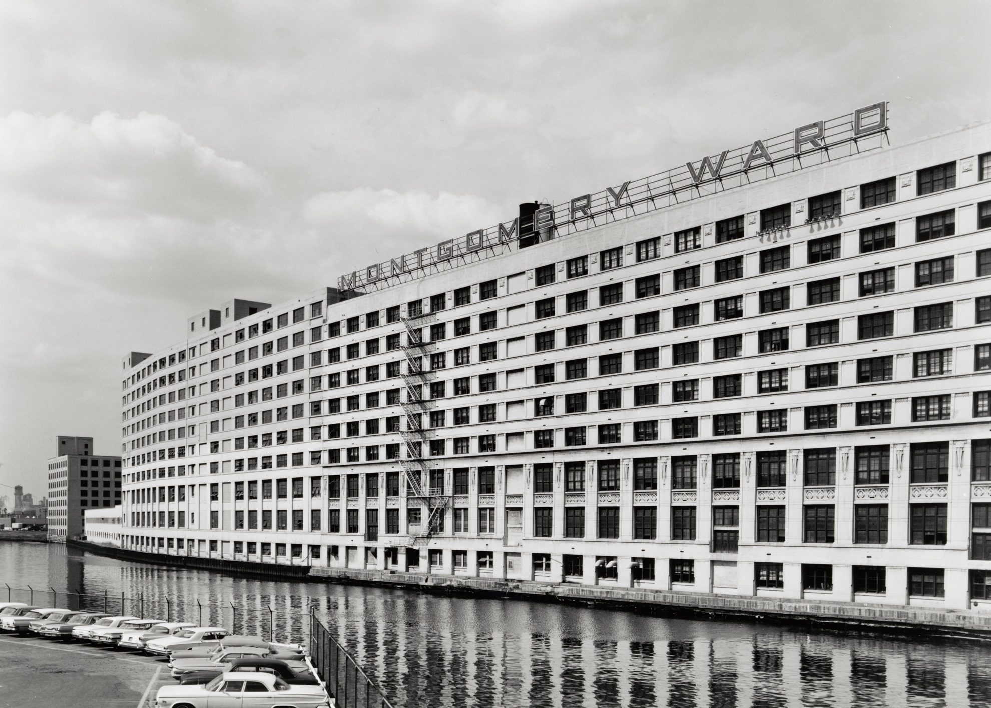 Exterior view of the Montgomery Ward Complex building, located along the North Branch of the Chicago River at 618 West Chicago Avenue, Near North Side, Chicago, Illinois, circa 1960s.