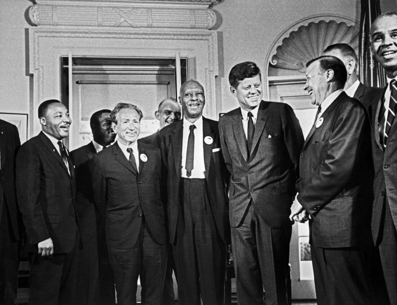 Martin Luther King and John F. Kennedy with civil rights leaders