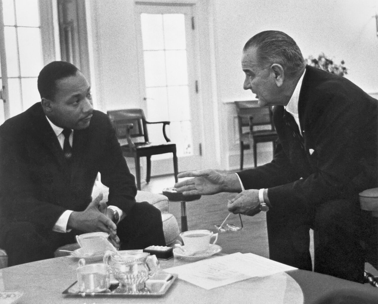 Martin Luther King Jr. meets with President Johnson at the White House.
