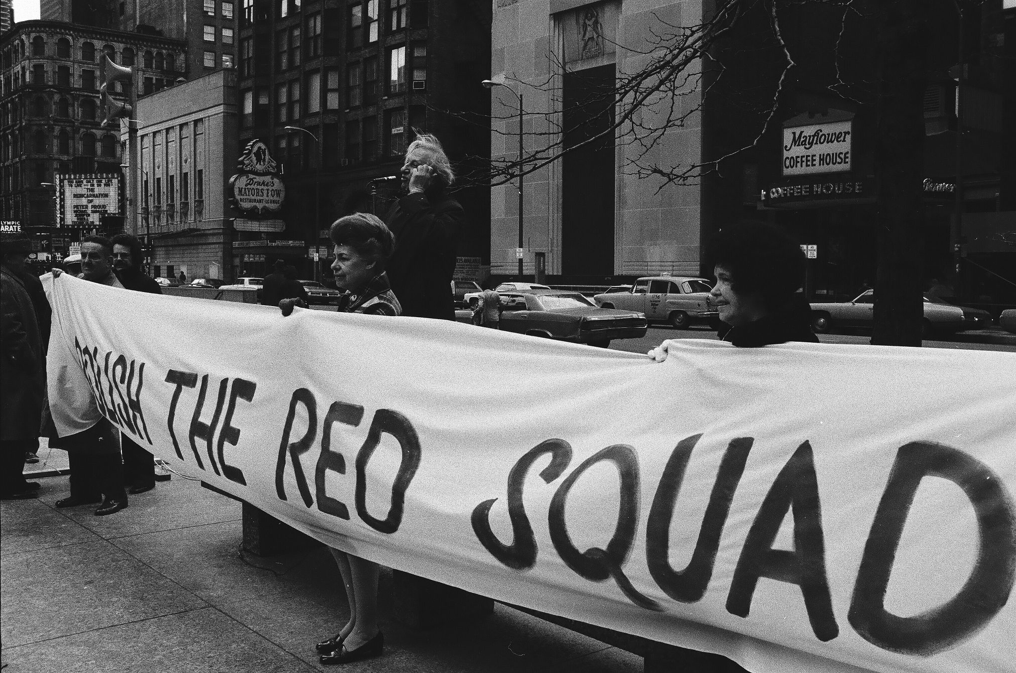 A group of protesters rally against the Red Squad, at the Civic Center (Richard J. Daley Center) 50 West Washington Street, Chicago, Illinois.