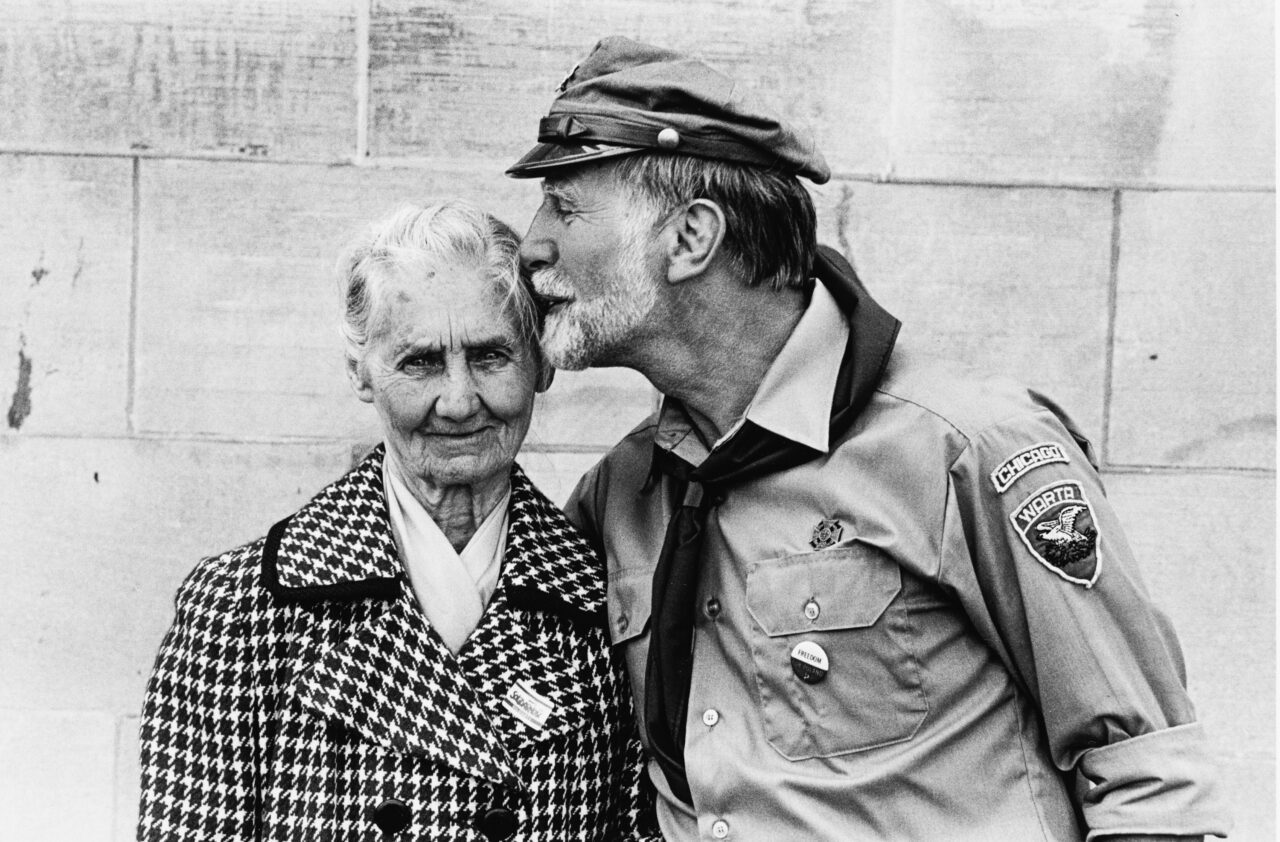 Man kissing his mother on Mother’s Day at Holy Trinity Polish Church