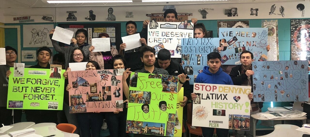IJLA_photo – IJLA students holding signs – CHM lobby – High res -AR
