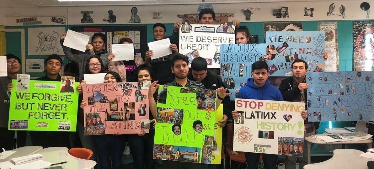 IJLA_photo – IJLA students holding signs – CHM lobby – High res.resize.1200