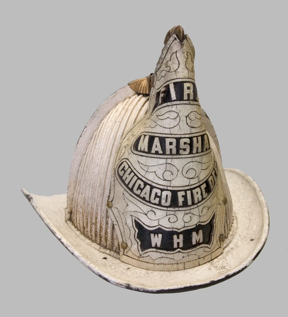 Front view of a Chicago Fire Department fire marshall helmet used during the Chicago Fire of 1871
