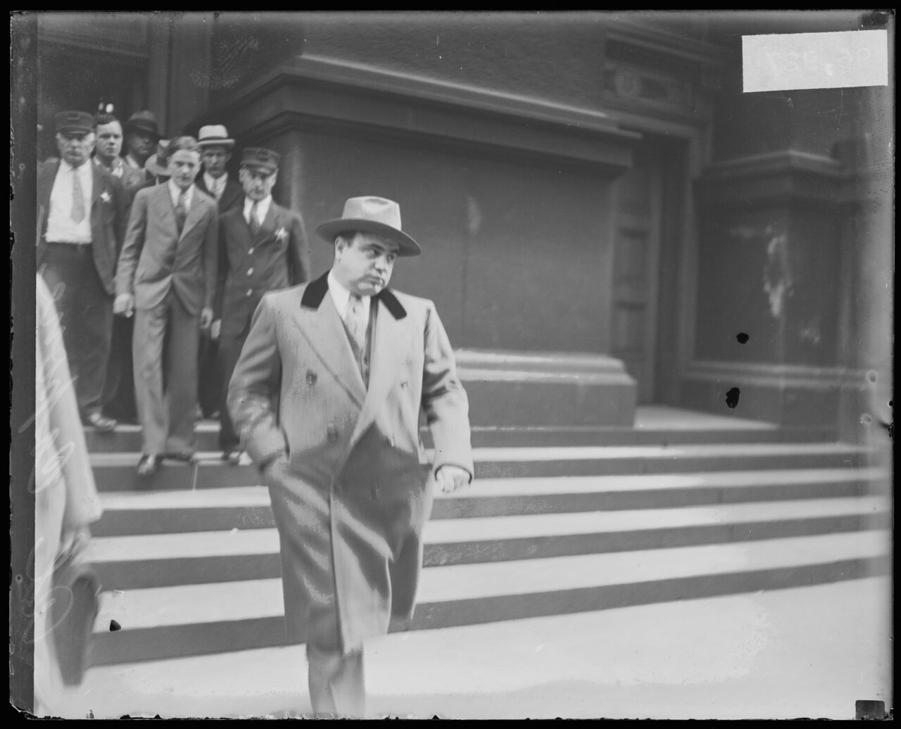 Al Capone leaving court during trial for tax evasion.