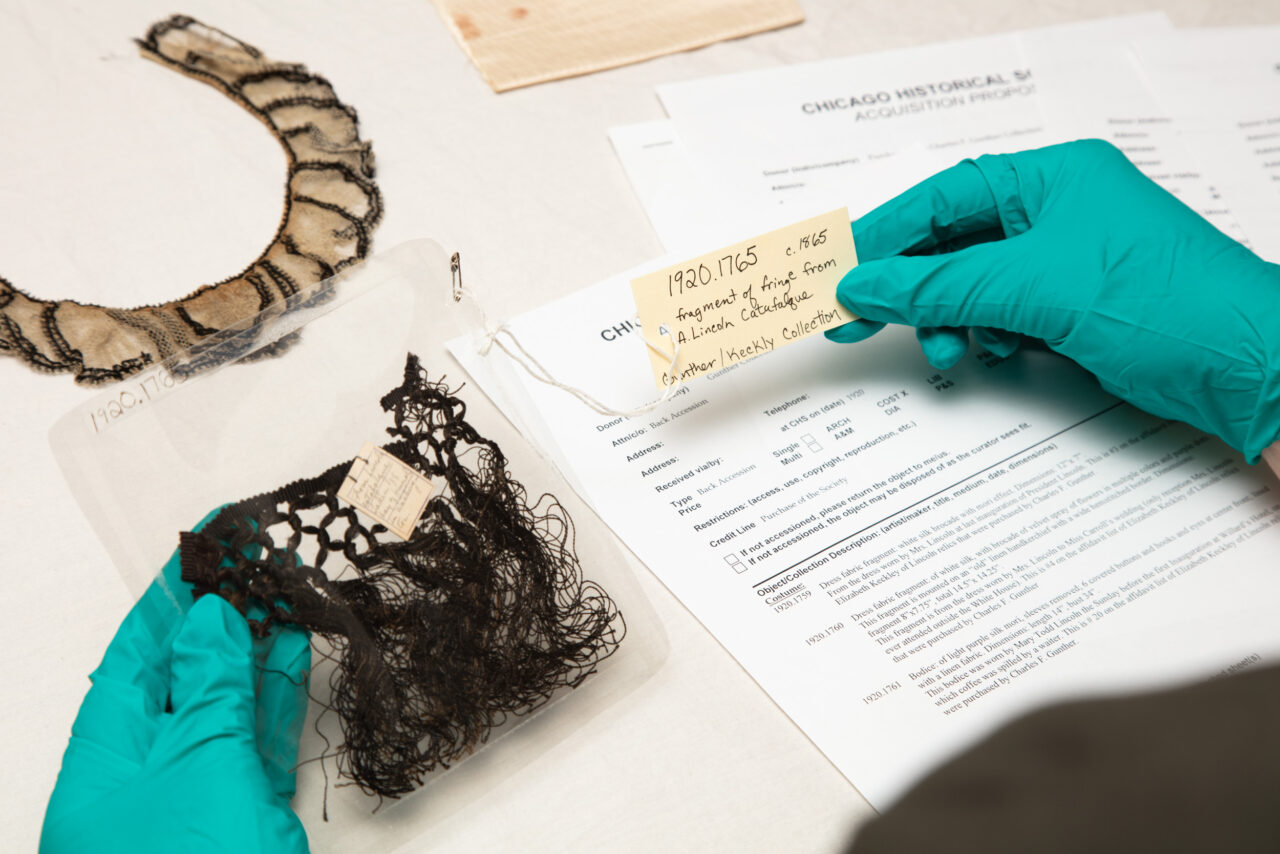 Collections Manager Jessica Pushor conducting research on objects for exhibition